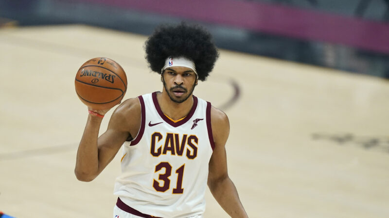 Cleveland Cavaliers' Jarrett Allen looks to pass in the first half of an NBA basketball game against the Oklahoma City Thunder, Sunday, Feb. 21, 2021, in Cleveland. (AP Photo/Tony Dejak)