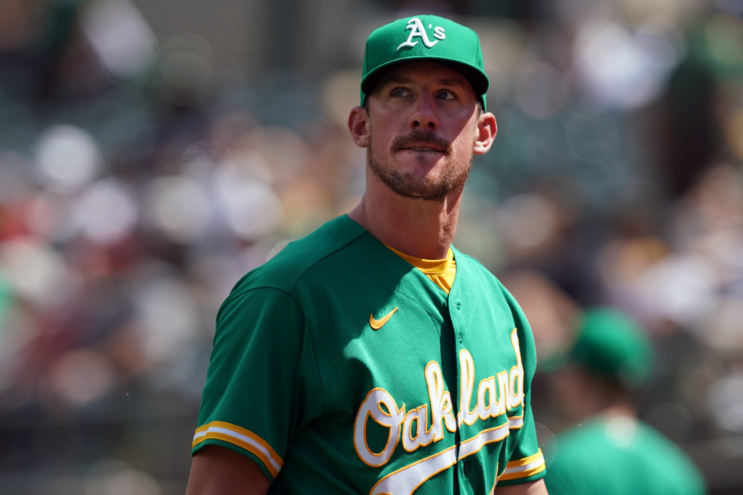Jul 18, 2021; Oakland, California, USA; Oakland Athletics starting pitcher Chris Bassitt (40) walks towards the dugout during the seventh inning against the Cleveland Indians at RingCentral Coliseum. Mandatory Credit: Darren Yamashita-USA TODAY Sports