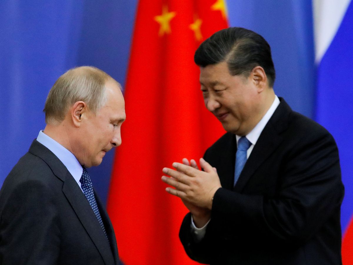 El presidente ruso, Vladimir Putin, junto a su homólogo chino, Xi Jingping. (Reuters)