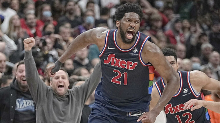 Apr 20, 2022; Toronto, Ontario, CAN; Philadelphia 76ers center Joel Embiid (21) celebrates scoring the game winning basket against the Toronto Raptors during overtime of game three of the first round for the 2022 NBA playoffs at Scotiabank Arena. Mandatory Credit: John E. Sokolowski-USA TODAY Sports