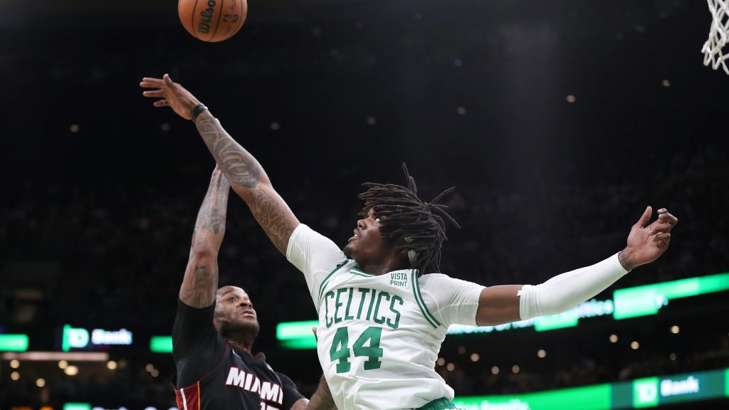 May 23, 2022; Boston, Massachusetts, USA; Miami Heat forward P.J. Tucker (17) shoots the ball over Boston Celtics center Robert Williams III (44) in the first half during game four of the 2022 eastern conference finals at TD Garden. Mandatory Credit: Paul Rutherford-USA TODAY Sports