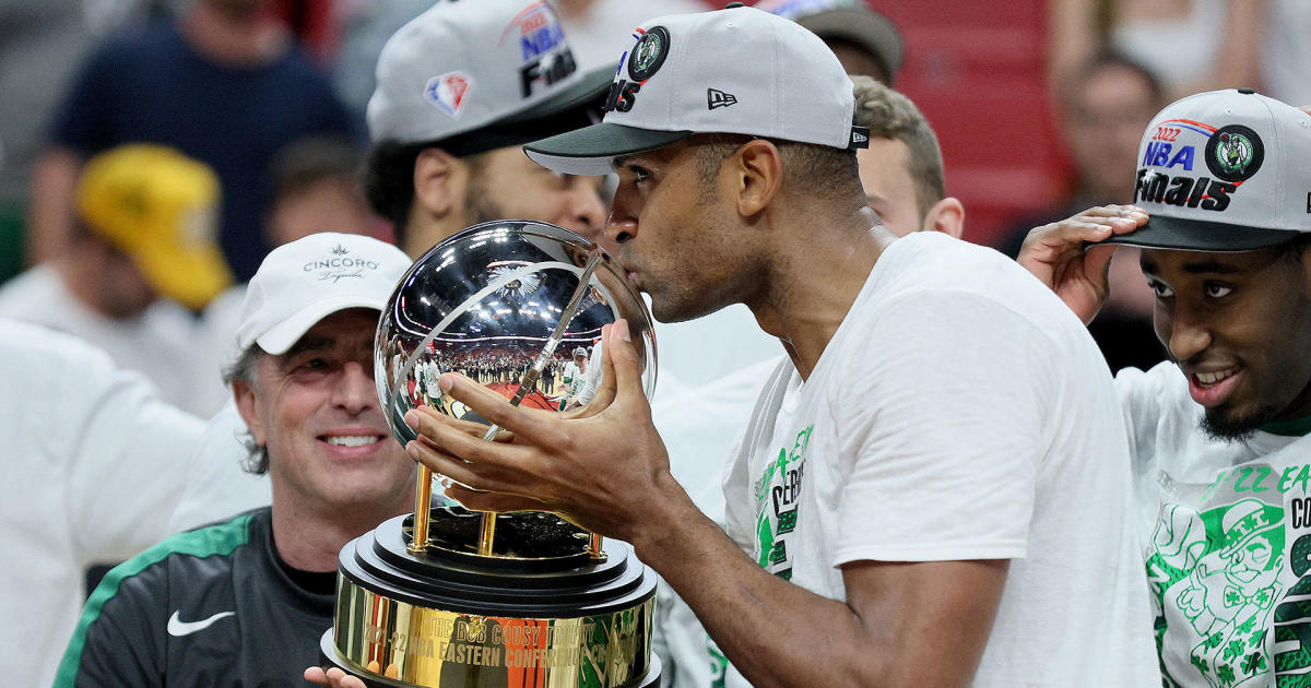MIAMI, FLORIDA - MAY 29: Al Horford #42 of the Boston Celtics kisses the Eastern Conference Bob Cousy champions trophy after defeating the Miami Heat in Game Seven to win the 2022 NBA Playoffs Eastern Conference Finals at FTX Arena on May 29, 2022 in Miami, Florida. NOTE TO USER: User expressly acknowledges and agrees that, by downloading and/or using this photograph, User is consenting to the terms and conditions of the Getty Images License Agreement. (Photo by Andy Lyons/Getty Images)