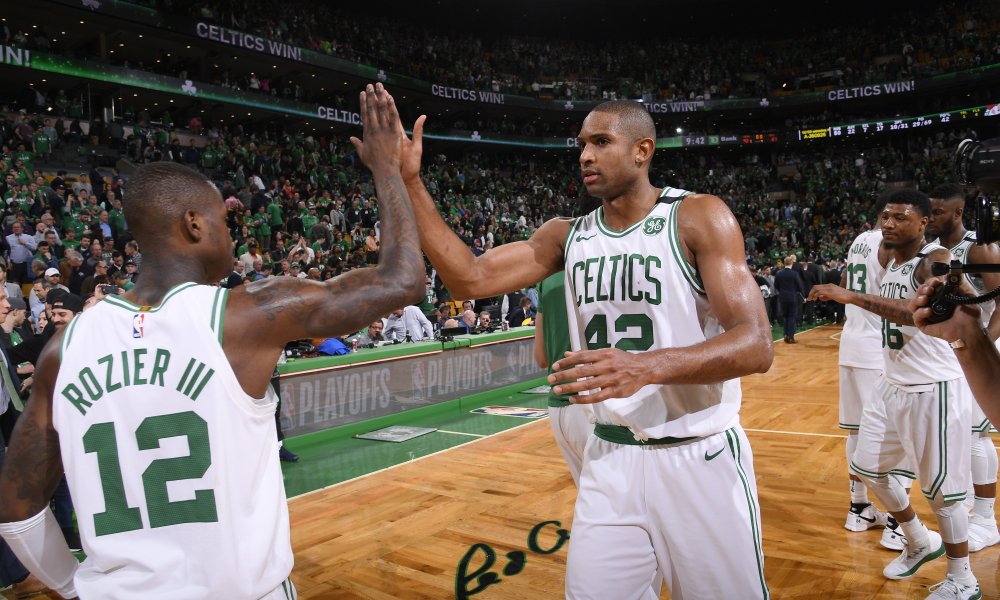 BOSTON, MA - APRIL 24:  Terry Rozier #12 and Al Horford #42 of the Boston Celtics exchange a high five after Game Five of Round One of the 2018 NBA Playoffs against the Milwaukee Bucks on April 24, 2018 at the TD Garden in Boston, Massachusetts.  NOTE TO USER: User expressly acknowledges and agrees that, by downloading and or using this photograph, User is consenting to the terms and conditions of the Getty Images License Agreement. Mandatory Copyright Notice: Copyright 2018 NBAE  (Photo by Brian Babineau/NBAE via Getty Images)