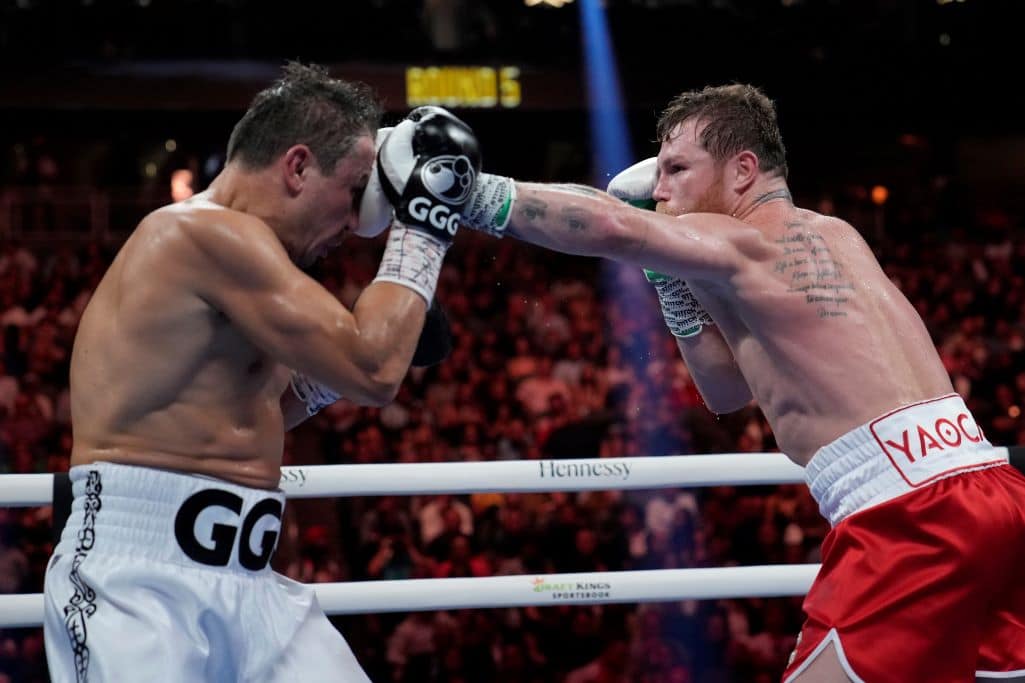 Canelo Alvarez lands a left to Gennady Golovkin in a super middleweight title boxing match Saturday, Sept. 17, 2022, in Las Vegas. (AP/JOHN LOCHER).