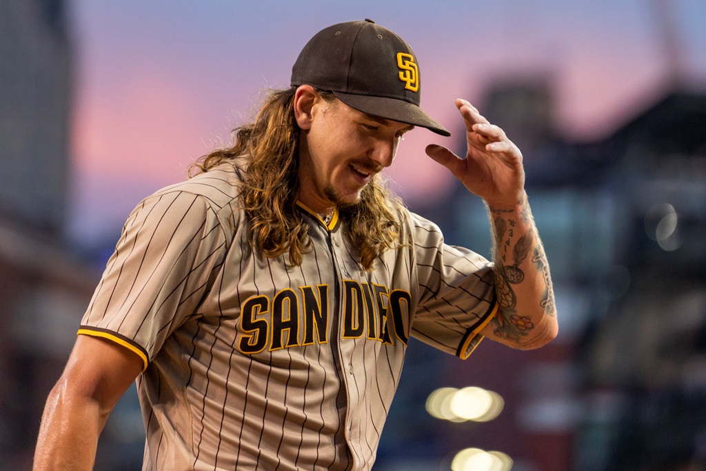 Jul 26, 2022; Detroit, Michigan, USA; San Diego Padres starting pitcher Mike Clevinger (52) walks to the dugout during the sixth inning in a game against the Detroit Tigers at Comerica Park. Mandatory Credit: Raj Mehta-USA TODAY Sports
