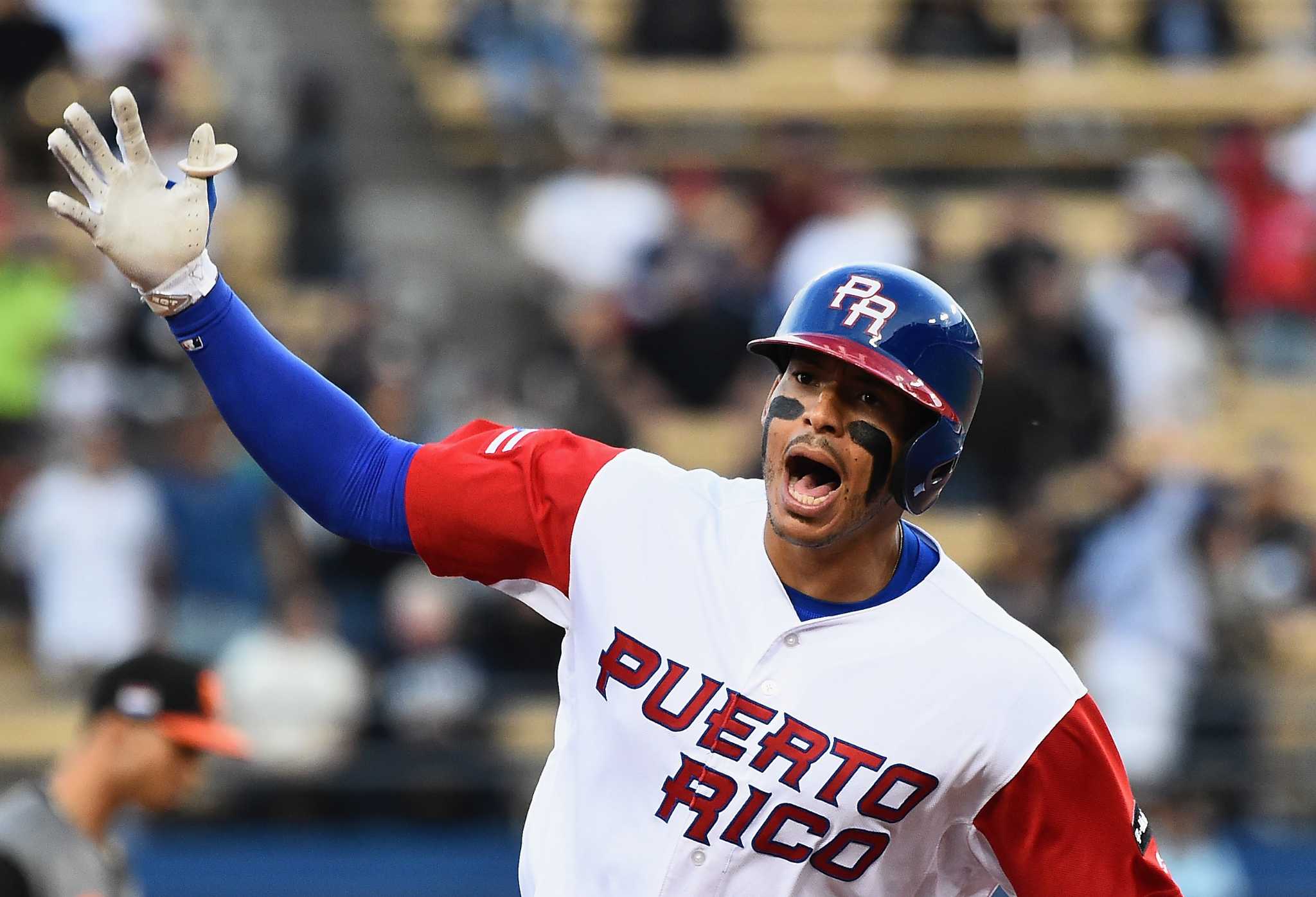 LOS ANGELES, CA - MARCH 20:  Carlos Correa #1 of the Puerto Rico rounds the bases after his two-run home run to tie the game 2-2 in the first inning against team Netherlands during Game 1 of the Championship Round of the 2017 World Baseball Classic at Dodger Stadium on March 20, 2017 in Los Angeles, California.  (Photo by Jayne Kamin-Oncea/Getty Images)