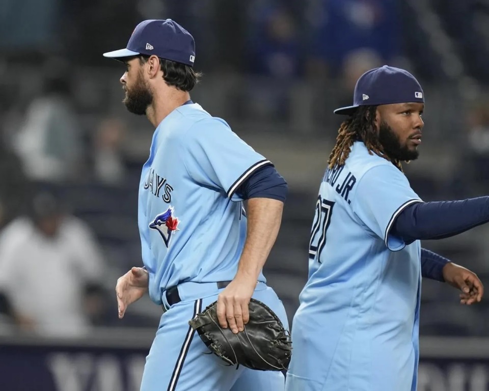 Vladi Jr. y Brandon Belt