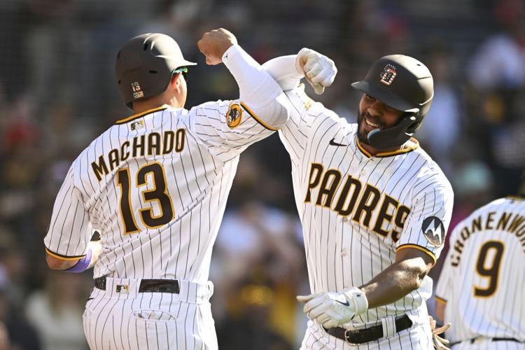 Xander Bogaerts y Machado