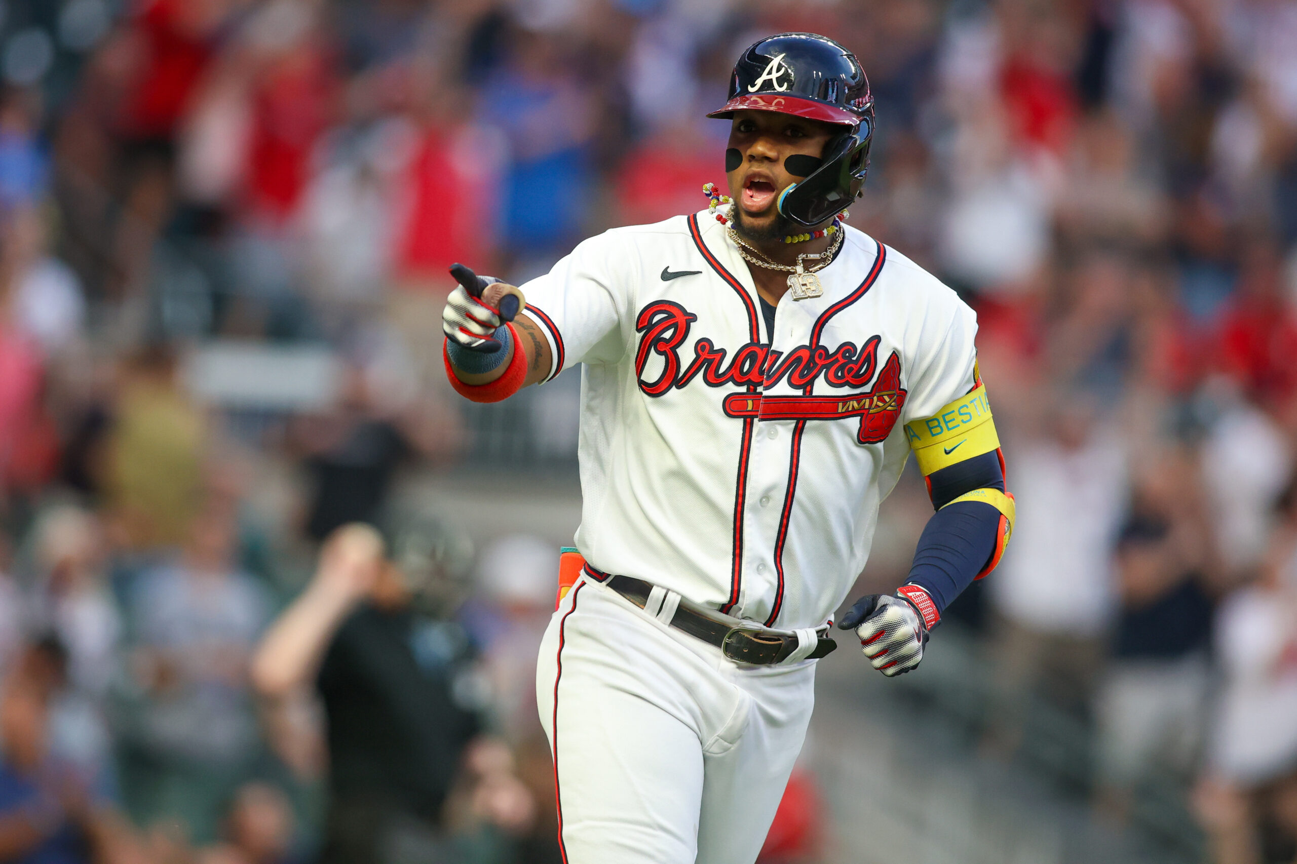 Sep 19, 2023; Atlanta, Georgia, USA; Atlanta Braves right fielder Ronald Acuna Jr. (13) reacts after a home run against the Philadelphia Phillies in the first inning at Truist Park. Mandatory Credit: Brett Davis-USA TODAY Sports